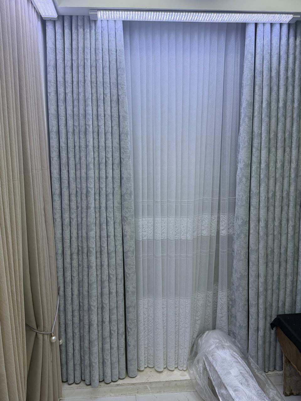 Curtains styled in a furnished room