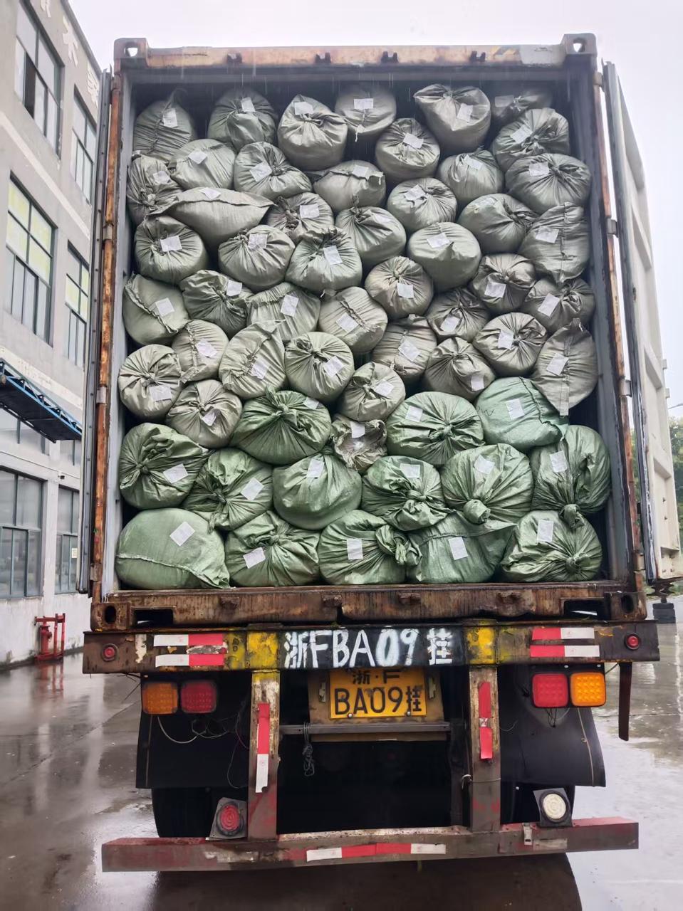 Container loaded with fabric bales in China